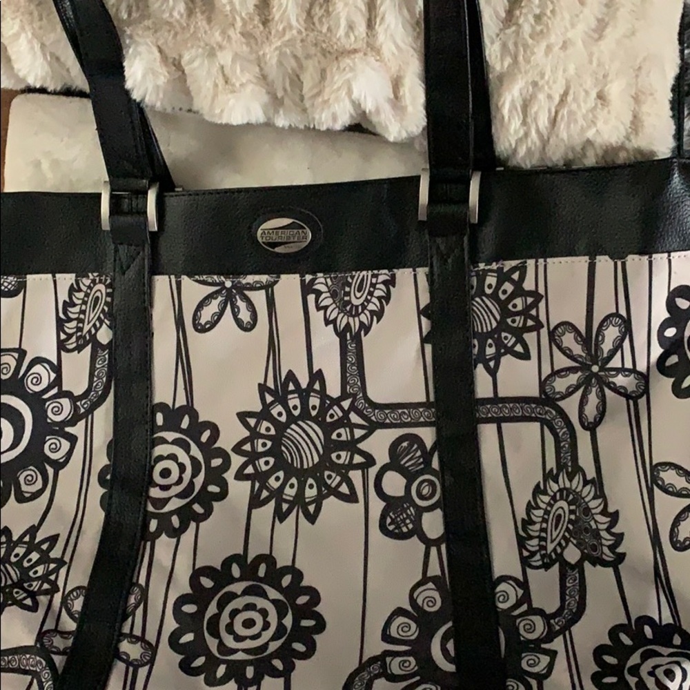 American Tourister weekend bag.